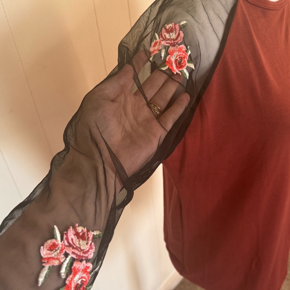 LuLaRoe Floral Sleeve Top. Size M. Comfy jersey material.